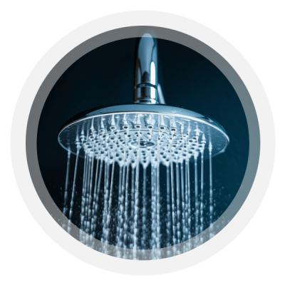 Limescale free and clean chrome shower head with fast flowing water coming out